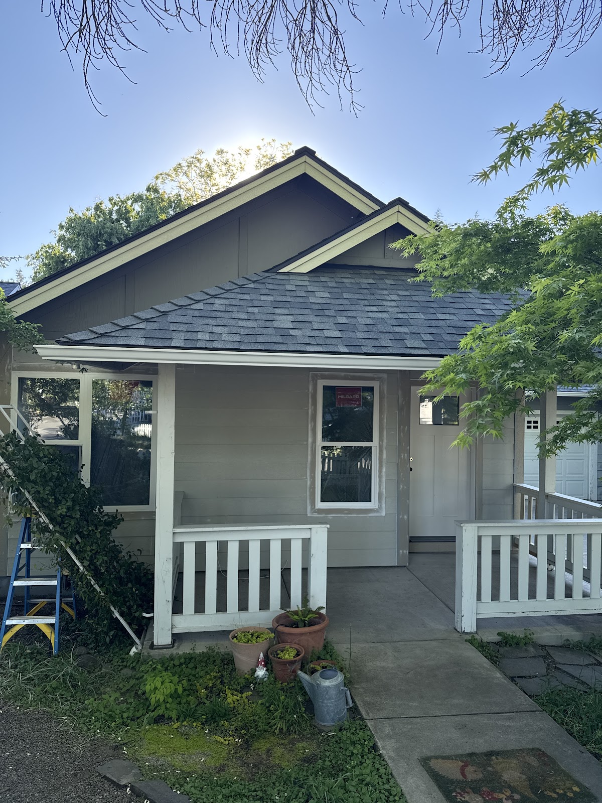 Completed roof replacement, front porch view, Medford Oregon